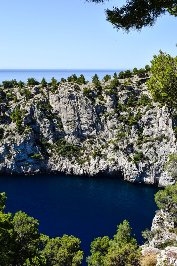 Breathtaking view of the rocky Calanques and deep blue sea in Provence, France.