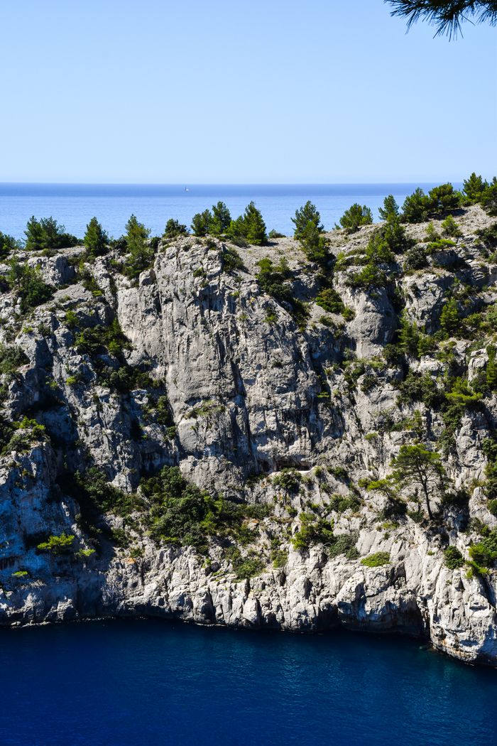 services-03 A breathtaking view of the rocky cliffs in Calanques, Provence, France.